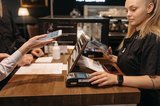 Customer Making Payment With POS System